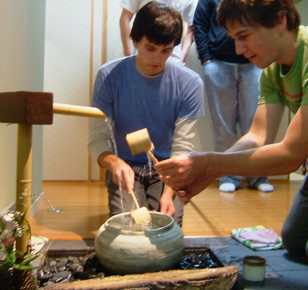 KCP students cleansing ritual before tea ceremony