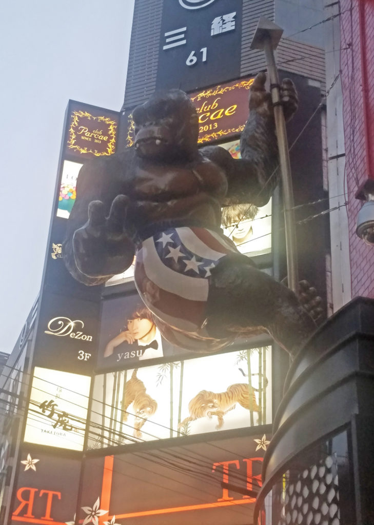 A giant gorilla display gives the peace sign at Kabuki-cho.
