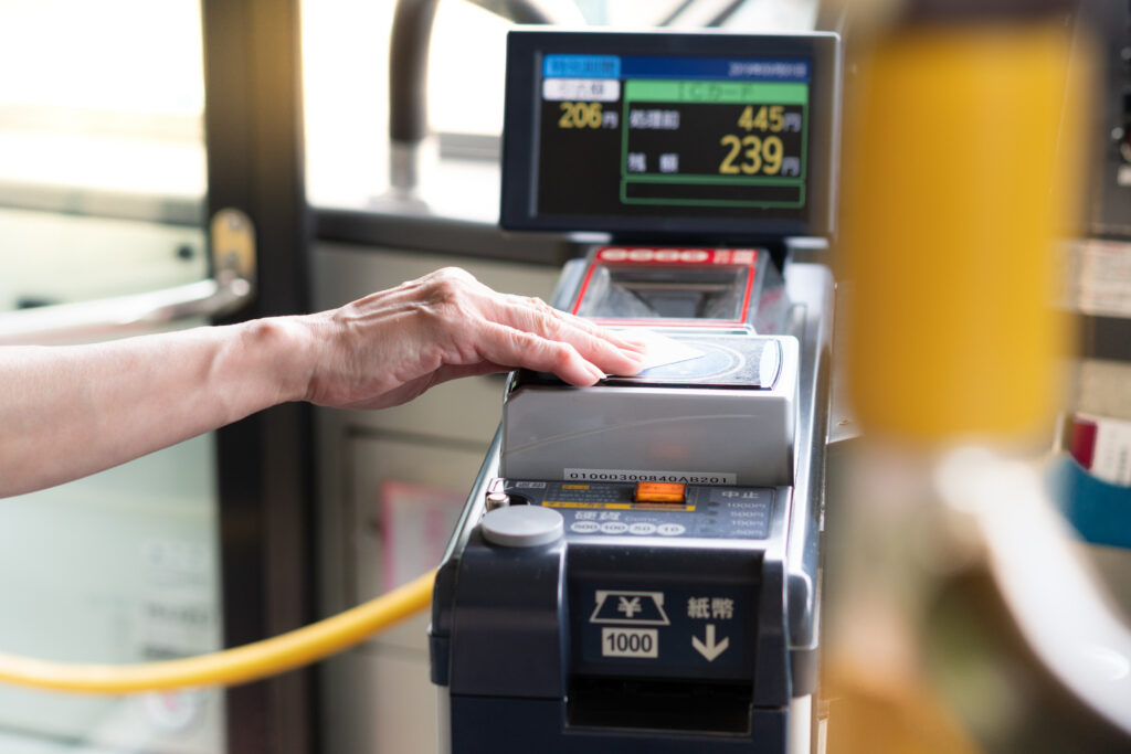 A contactless card reader on a Tokyo city bus